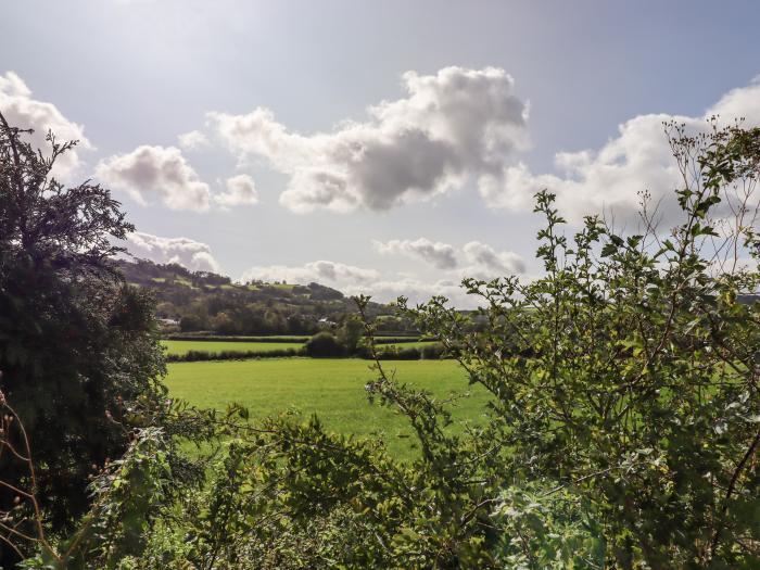 2 Coldeast Cottages, is near Newton Abbot, Devon. Two-bedroom, Grade II listed cottage. Rural views.