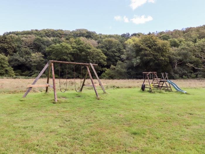 Trout River Lodge near Moretonhampstead, Devon. Detached lodge in a beautiful setting. Two bedrooms.