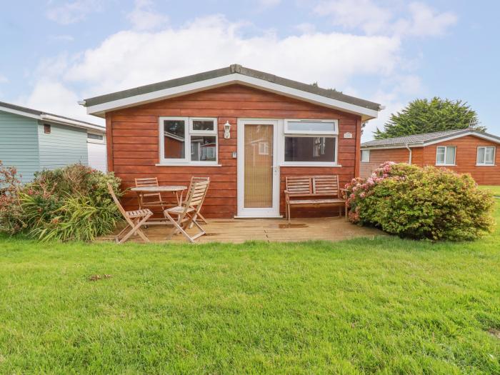 Chalet 208 in St Merryn, Cornwall. Two-bed lodge, with garden and open-plan living. Family-friendly.