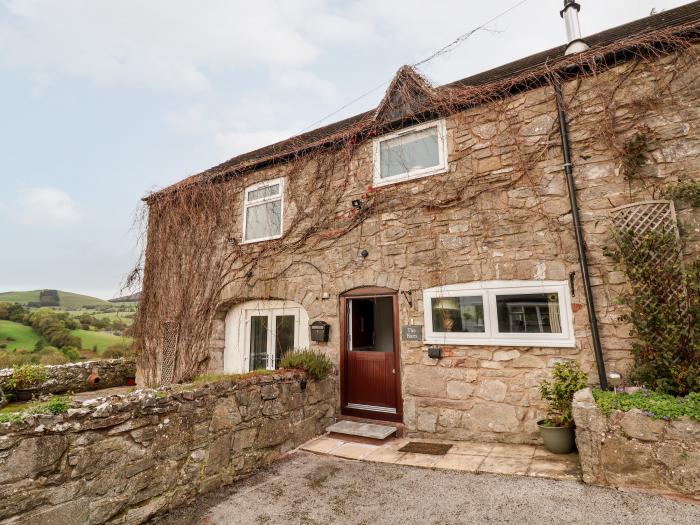 The Barn in Llanarmon-Yn-Ial, North Wales with indoor heated pool, valley view and woodburning stove