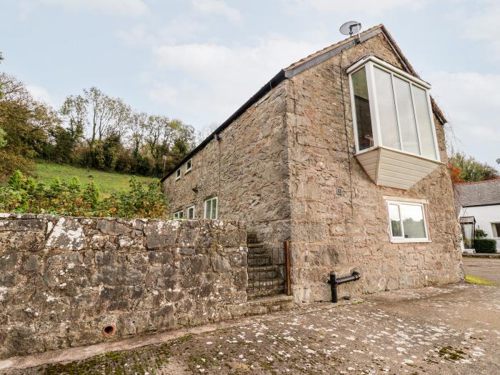 The Barn in Llanarmon-Yn-Ial, North Wales with indoor heated pool, valley view and woodburning stove