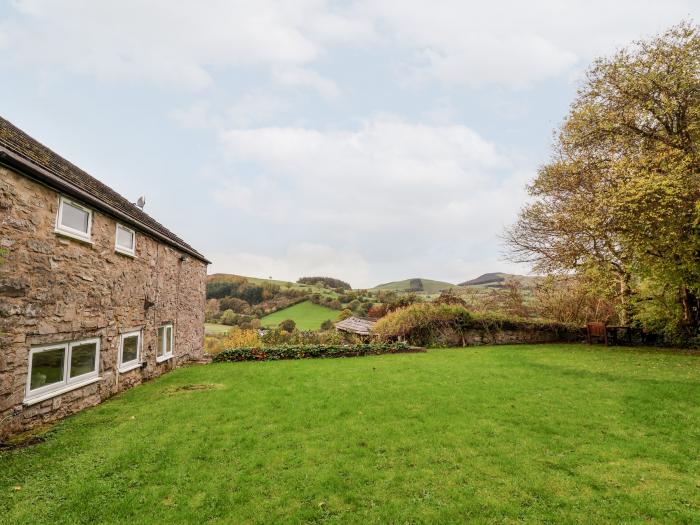 The Barn in Llanarmon-Yn-Ial, North Wales with indoor heated pool, valley view and woodburning stove