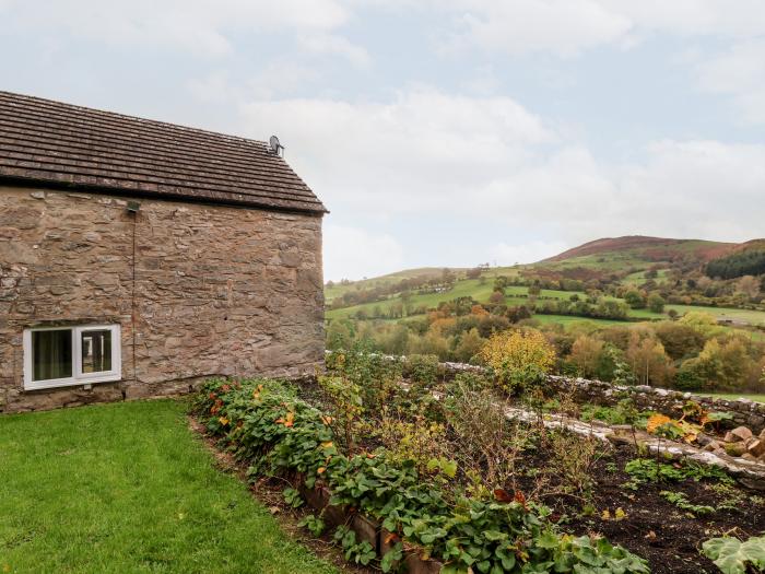 The Barn in Llanarmon-Yn-Ial, North Wales with indoor heated pool, valley view and woodburning stove