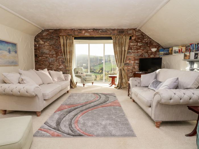 The Barn in Llanarmon-Yn-Ial, North Wales with indoor heated pool, valley view and woodburning stove