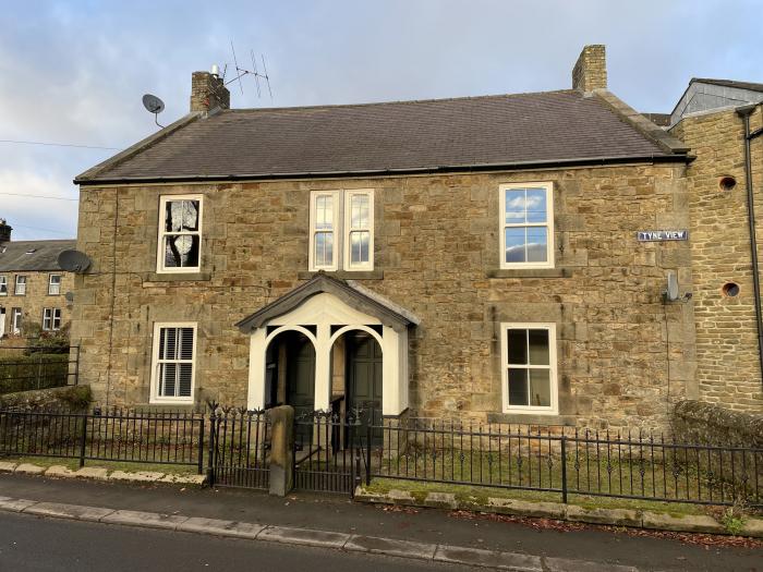 1 Tyne View, in the centre of Bellingham, Northumberland. Woodburning stove. Pet-friendly. Enc lawn.