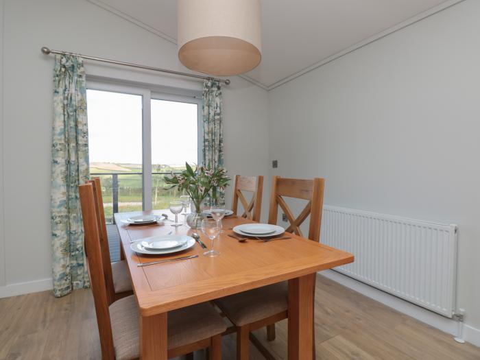 Primrose Lodge, is near Dartmouth, in Devon. Two-bedroom lodge, set rurally. Open-plan living.