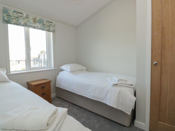 Primrose Lodge, is near Dartmouth, in Devon. Two-bedroom lodge, set rurally. Open-plan living.