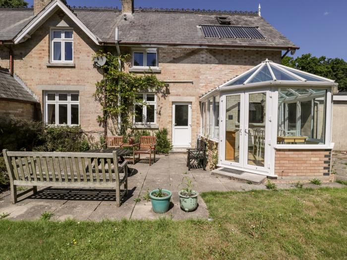 2 Heath Cottages, Sandford, Dorset. Woodburning stove. Off-road parking. Pet-friendly. Front garden.