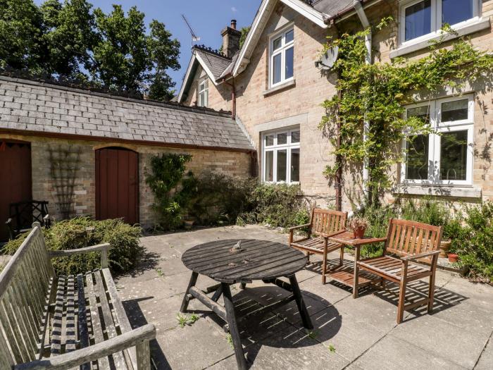 2 Heath Cottages, Sandford, Dorset. Woodburning stove. Off-road parking. Pet-friendly. Front garden.