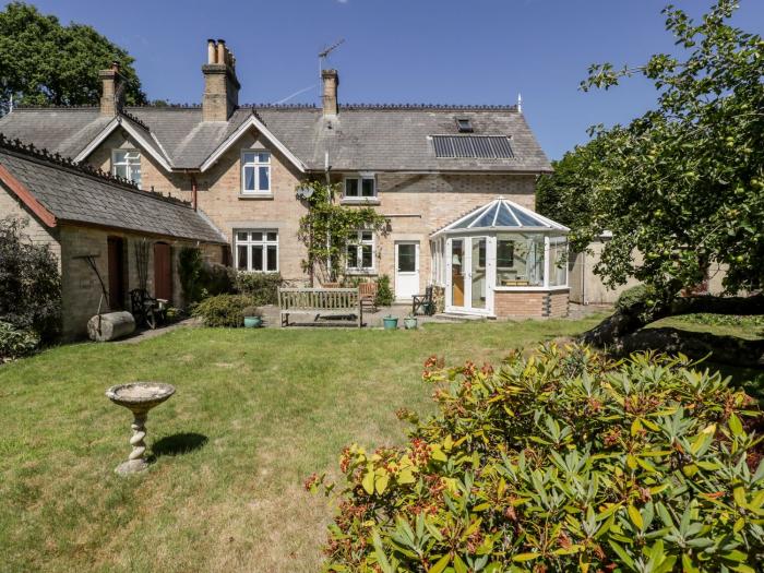 2 Heath Cottages, Sandford, Dorset. Woodburning stove. Off-road parking. Pet-friendly. Front garden.
