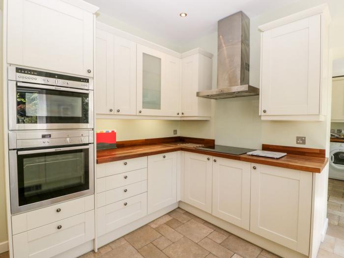 2 Heath Cottages, Sandford, Dorset. Woodburning stove. Off-road parking. Pet-friendly. Front garden.