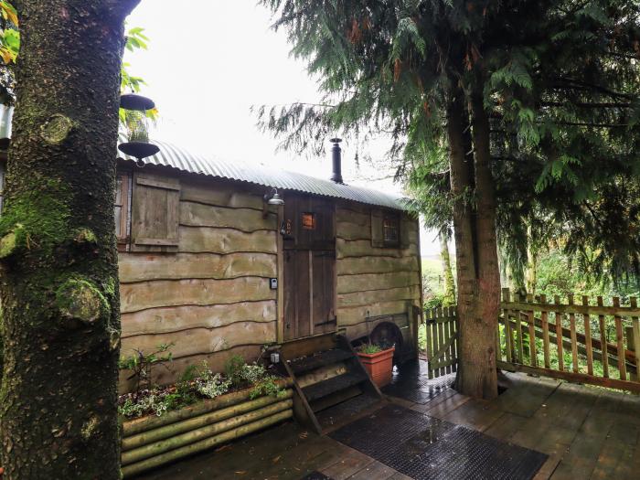 Cowboy is near Beguildy, Powys. Charming, wood-clad hut, ideal for families. Countryside views. Pets