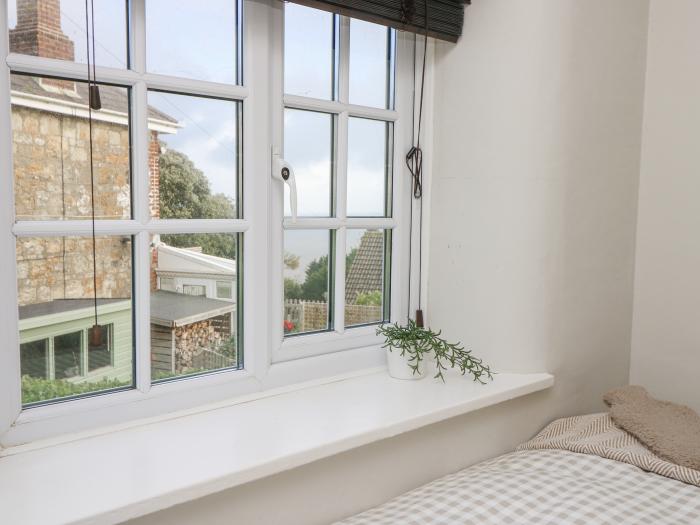 36 Leeson Road in Ventnor, Isle of Wight. Two-bedroom home with sea views. Near beach and amenities.