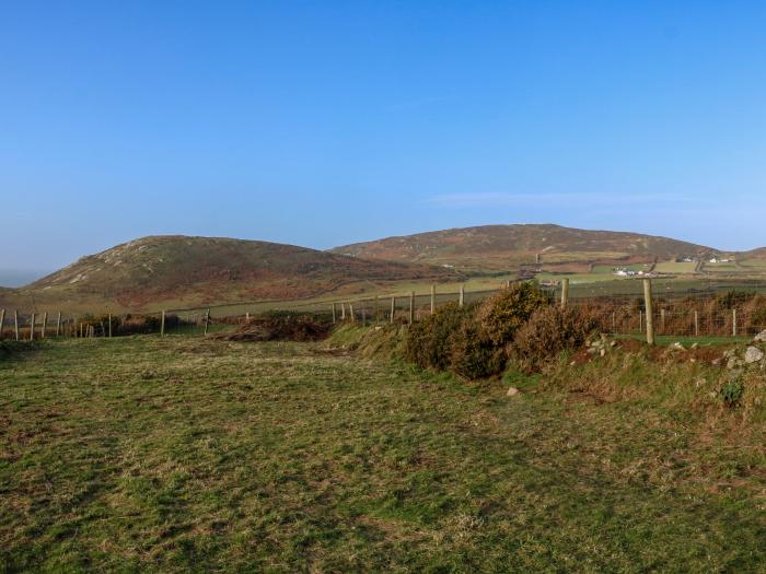 Bryn Canaid near Aberdaron, Gwynedd. Woodburning stove. Near a beach. Great views. Off-road parking.