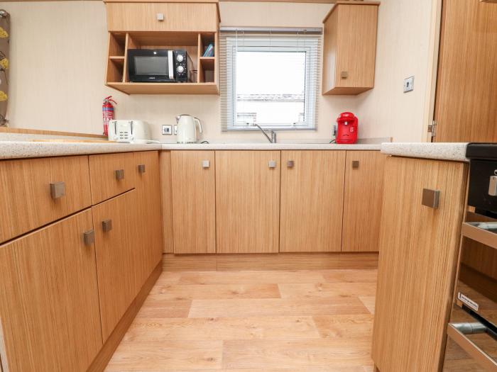 Sanctuary BP12, is in Heysham, Lancashire. Detached lodge. Open-plan living. On-site swimming pool.