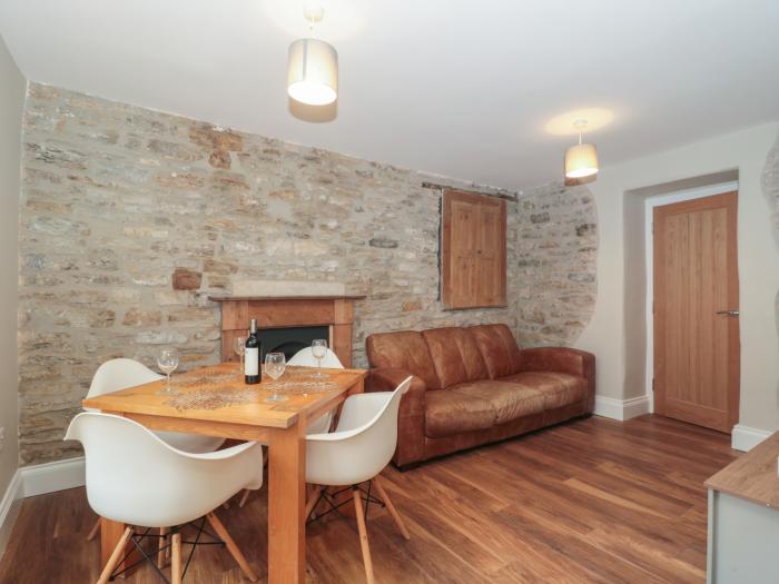 Flat 3, set in a Grade II listed building in Swanage, Dorset. Contemporary. Electric fire. Sea views