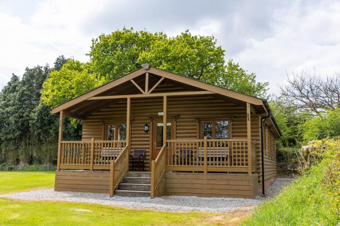 Tarka's Holt Log Cabin, Torrington, Devon. Set on a spacious parkland with on-site facilities. WiFi.