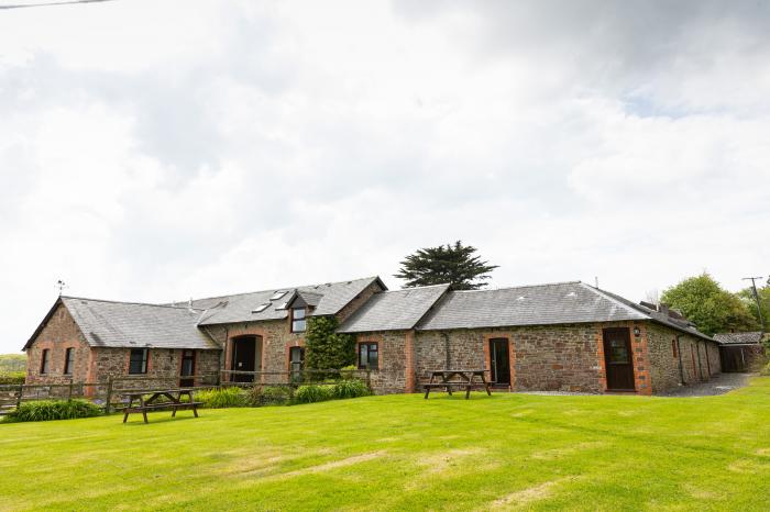 Tarka's Holt Log Cabin, Torrington, Devon. Set on a spacious parkland with on-site facilities. WiFi.