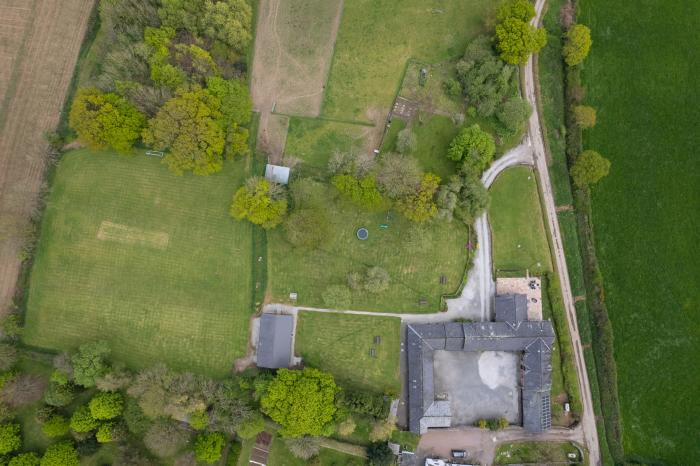 Tarka's Holt Log Cabin, Torrington, Devon. Set on a spacious parkland with on-site facilities. WiFi.