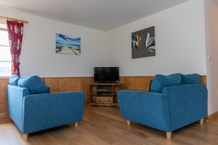 Tarka's Holt Log Cabin, Torrington, Devon. Set on a spacious parkland with on-site facilities. WiFi.