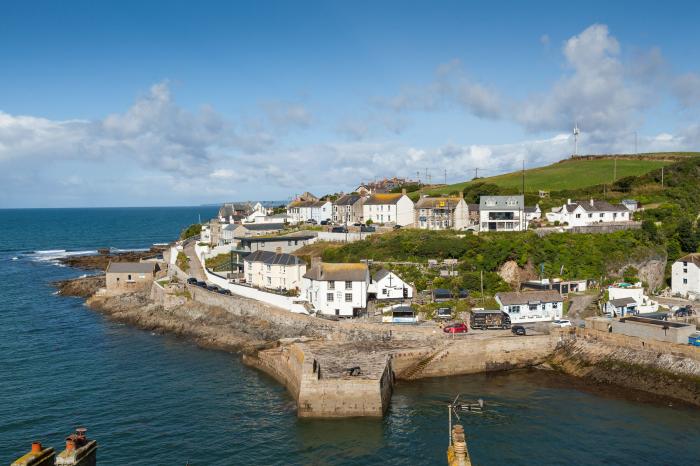 Chy Lowen in Porthleven, Cornwall. Mid-terrace, reverse-level home with sea views. Near beach. Pets.