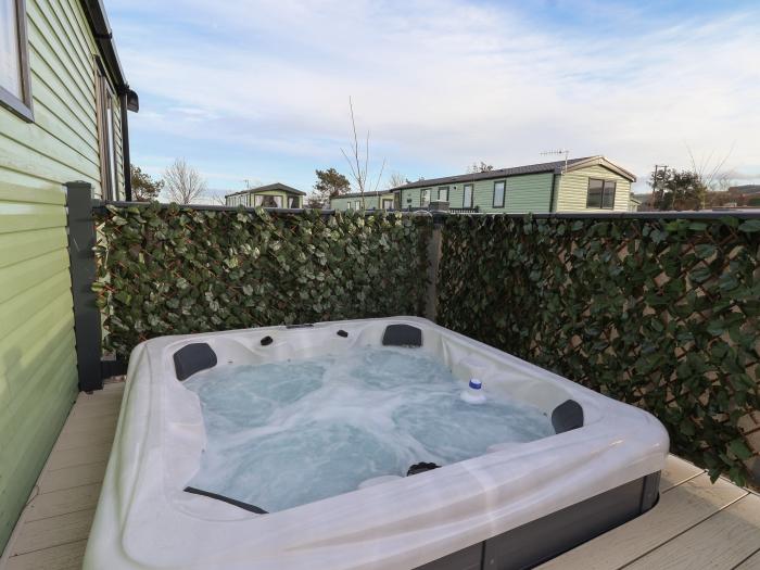 Lot 31 is located near Malton, North Yorkshire. Two-bedroom lodge with hot tub. Pet-friendly. Family
