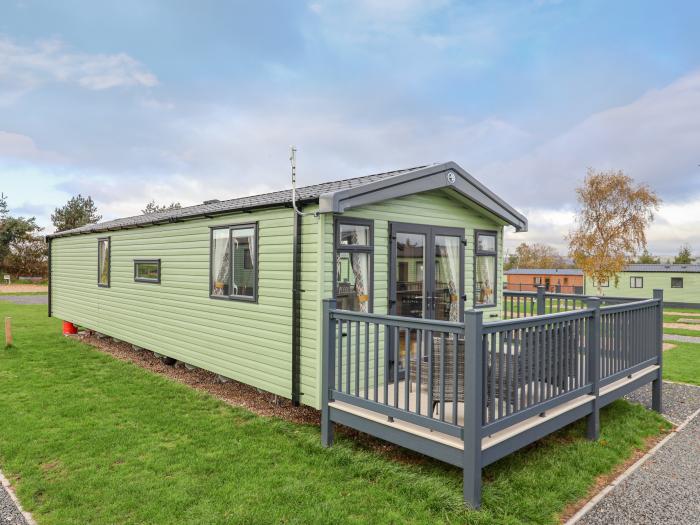 Lot 31 is located near Malton, North Yorkshire. Two-bedroom lodge with hot tub. Pet-friendly. Family