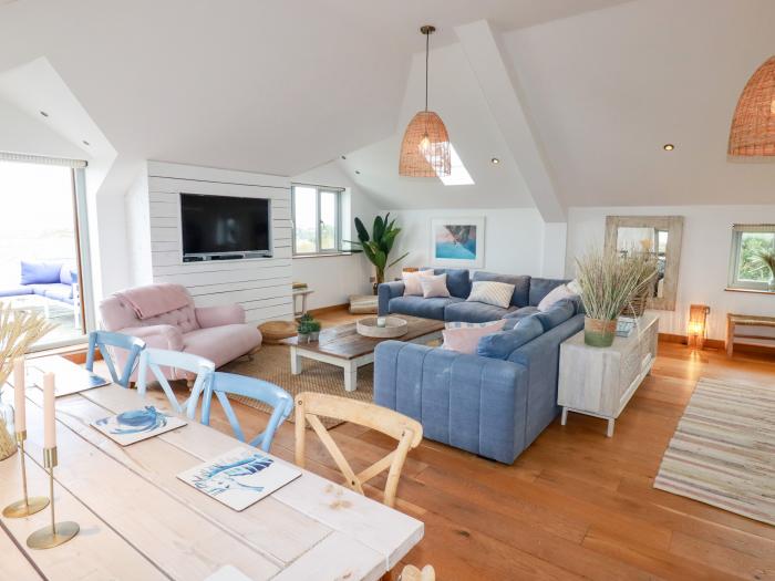 Sea View House, is in Crantock, Cornwall. Close to amenities. Near a beach. Pet-friendly. Open-plan.