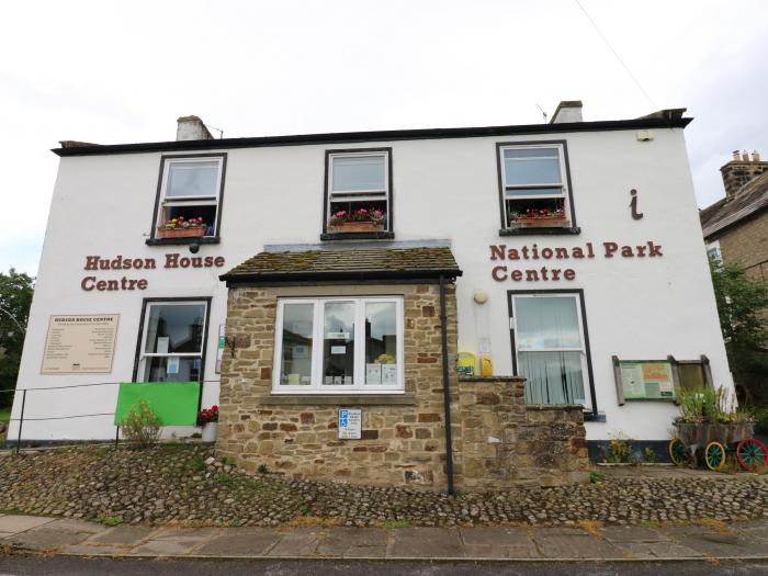 Harker View Cottage in Reeth, North Yorkshire. Pet-friendly. Woodburning stove. Enclosed patio. WiFi