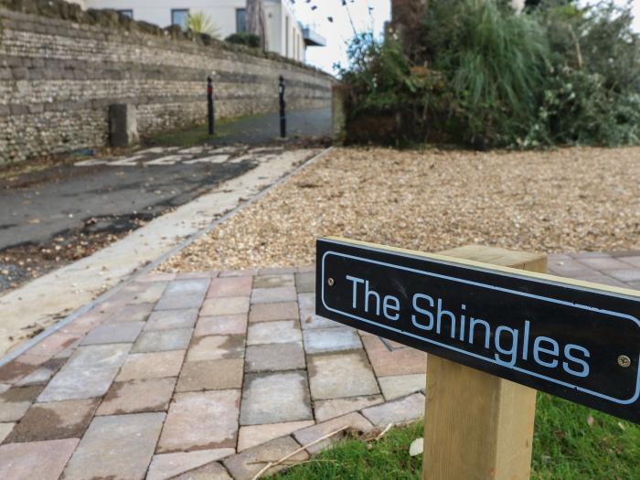 The Shingles, Sandown, Isle of Wight. 2 bedrooms. Shop, pub & beach nearby. Garden. Off-road parking