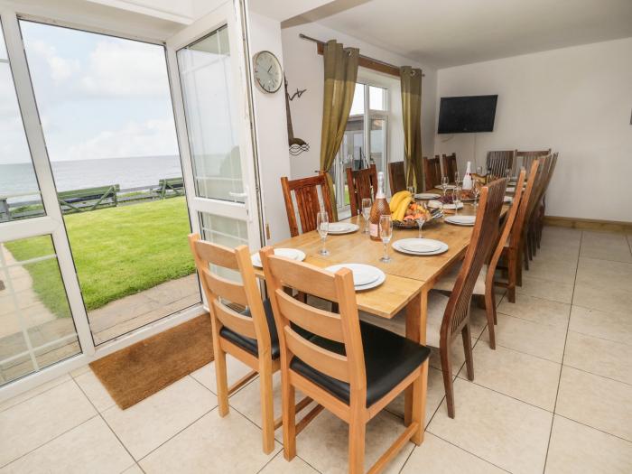 Waters Edge is in Beadnell, Northumberland, 6bed, hot tub, dog-friendly, on the beach, lovely views.