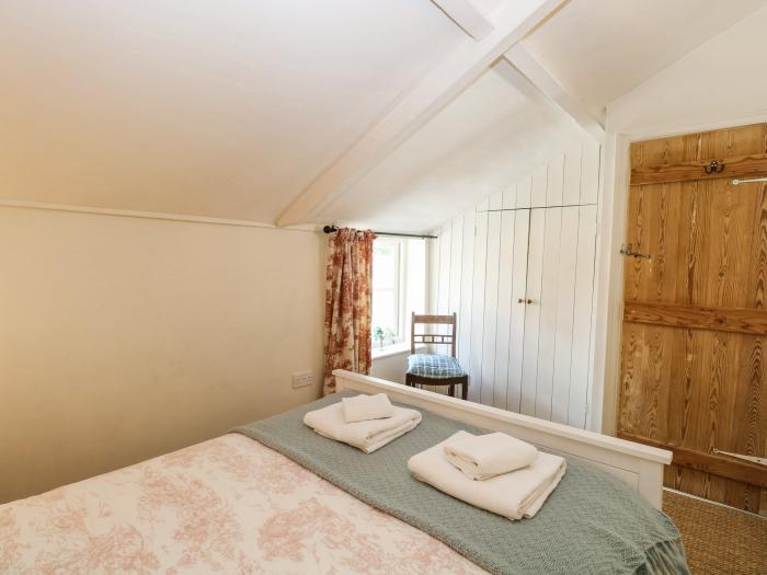 Bridge Cottage, is in Aylsham, Norfolk. Two-bedroom, characterful cottage. Private, enclosed garden.