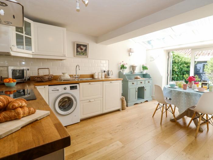 Bridge Cottage, is in Aylsham, Norfolk. Two-bedroom, characterful cottage. Private, enclosed garden.