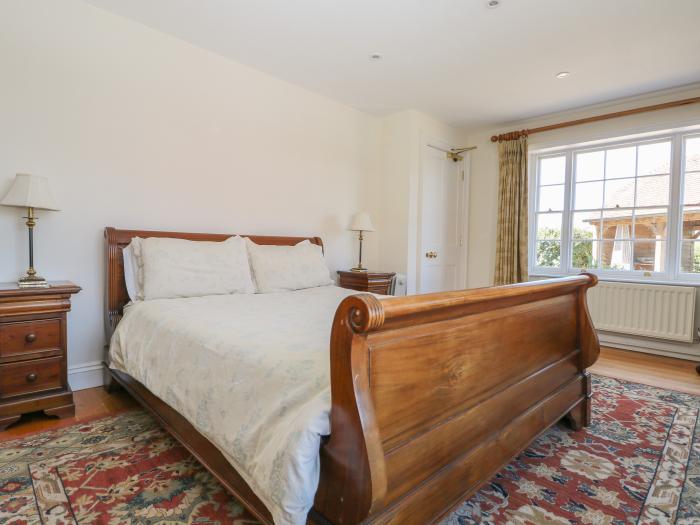 Groomes Country House near Farnham, Surrey. Six-bedroom, Grade II listed home with games room. Pets.