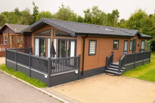 Penny Lodge the Stunning new luxury Lodge with hot tub situated in idyllic surroundings